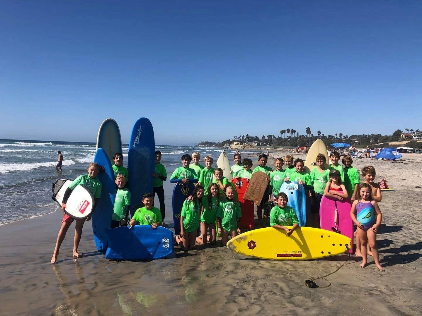 SJA surf team at the beach